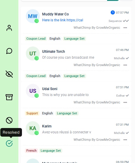 Resolved view showing completed conversations with labels and agent assignments